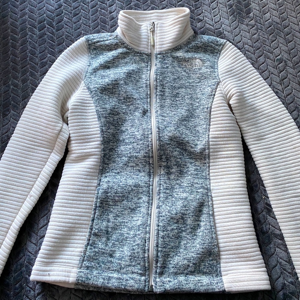 North face zip up jacket.